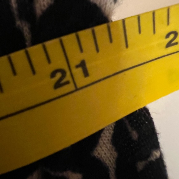 Questions by say what women’s sweater, cardigan, fringe size L black and cream - Picture 5 of 6